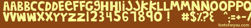 MTFJumpinJack-fontti – keltaiset fontit ruskealla taustalla