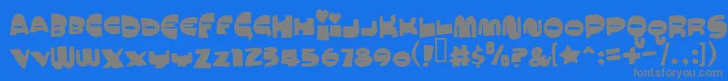 フォントmuchomacho – 青い背景に灰色の文字