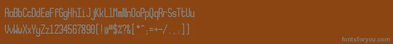 Xlmonoalt Font – Gray Fonts on Brown Background