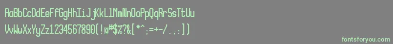 フォントXlmonoalt – 灰色の背景に緑のフォント