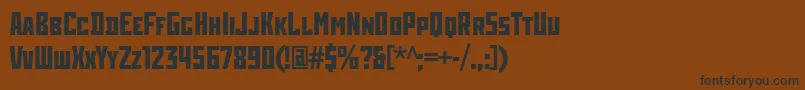 フォントRodchenkoCondensedBold – 黒い文字が茶色の背景にあります