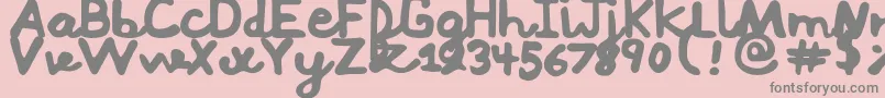 フォントMushi – ピンクの背景に灰色の文字