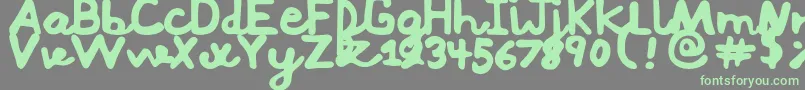 Mushi Font – Green Fonts on Gray Background