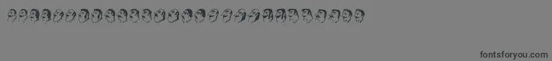 Mustachos-Schriftart – Schwarze Schriften auf grauem Hintergrund