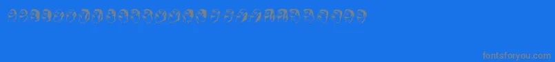 Mustachos-fontti – harmaat kirjasimet sinisellä taustalla