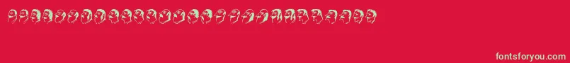 フォントMustachos – 赤い背景に緑の文字