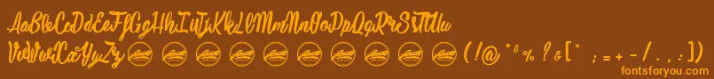 Mustardy PersonalUseOnly-Schriftart – Orangefarbene Schriften auf braunem Hintergrund