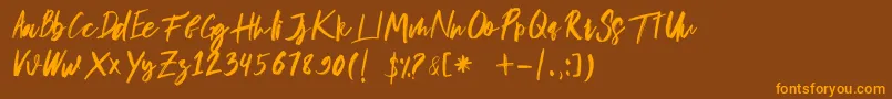 musuh Font – Orange Fonts on Brown Background