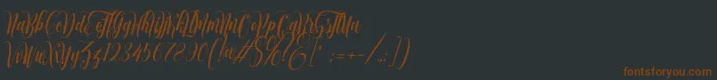 muthya-Schriftart – Braune Schriften auf schwarzem Hintergrund