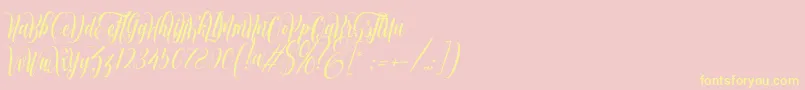 muthya-Schriftart – Gelbe Schriften auf rosa Hintergrund