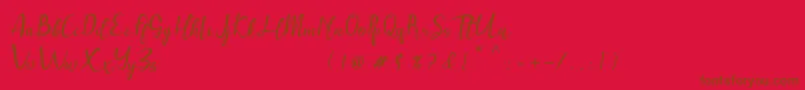 Czcionka Muttung – brązowe czcionki na czerwonym tle