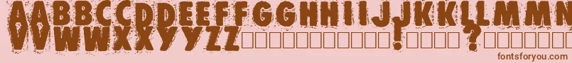 Muzo-fontti – ruskeat fontit vaaleanpunaisella taustalla