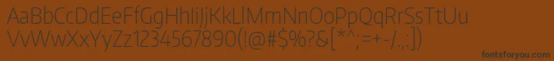 EncodesanscondensedThin-Schriftart – Schwarze Schriften auf braunem Hintergrund