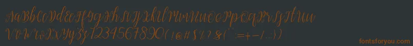 Шрифт My Darling Script  – коричневые шрифты на чёрном фоне