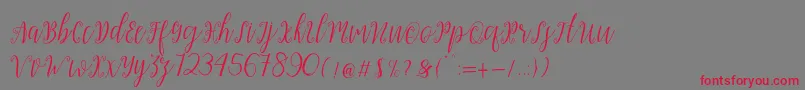 フォントMy Darling Script  – 赤い文字の灰色の背景