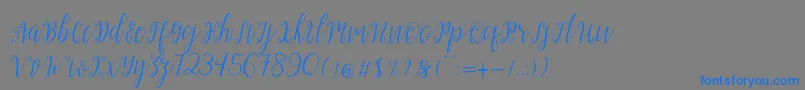 Czcionka My Darling Script – niebieskie czcionki na szarym tle