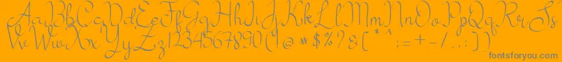 my mecca-Schriftart – Graue Schriften auf orangefarbenem Hintergrund