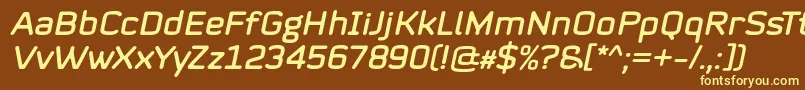 Mystag Italic Font by 7NTypes Font – Yellow Fonts on Brown Background