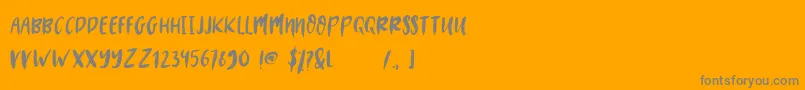 フォントMYSTERY 2019 – オレンジの背景に灰色の文字