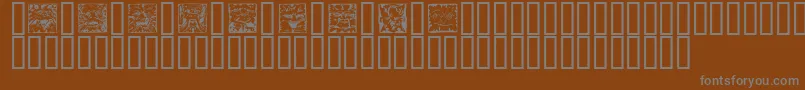 Czcionka MYTHS    – szare czcionki na brązowym tle