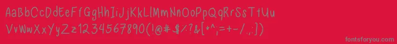 Fonte Nadezna s handwriting regular – fontes cinzas em um fundo vermelho