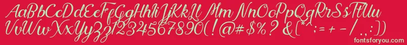 Nadhine Script Free Demo Font – Green Fonts on Red Background
