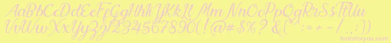 Fonte Nadhine Script Free Demo – fontes rosa em um fundo amarelo
