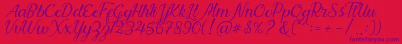 Nadhine Script Free Demo Font – Purple Fonts on Red Background