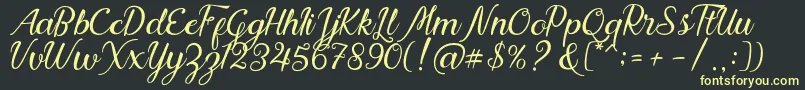 Nadhine Script Free Demo Font – Yellow Fonts on Black Background