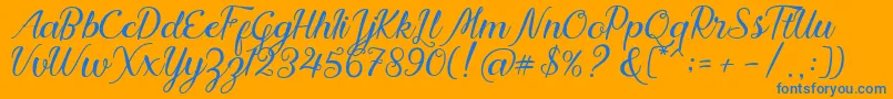 Nadhine Script Free Demo Font – Blue Fonts on Orange Background