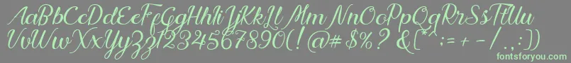 Nadhine Script Free Demo Font – Green Fonts on Gray Background