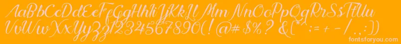 フォントNadhine Script Free Demo – オレンジの背景にピンクのフォント