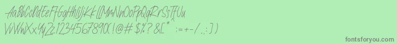 フォントNafeeda – 緑の背景に灰色の文字