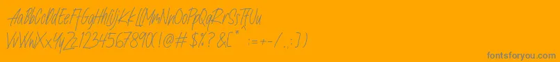 フォントNafeeda – オレンジの背景に灰色の文字