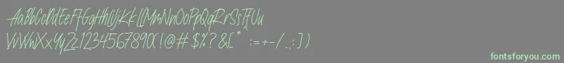 フォントNafeeda – 灰色の背景に緑のフォント