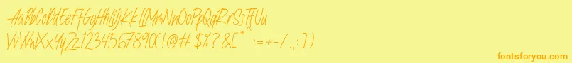 フォントNafeeda – オレンジの文字が黄色の背景にあります。