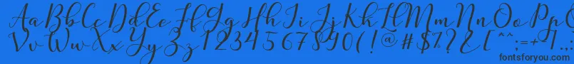 Nafigat Script-Schriftart – Schwarze Schriften auf blauem Hintergrund