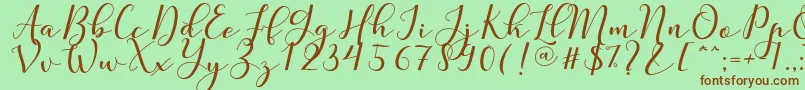 fuente Nafigat Script – Fuentes Marrones Sobre Fondo Verde