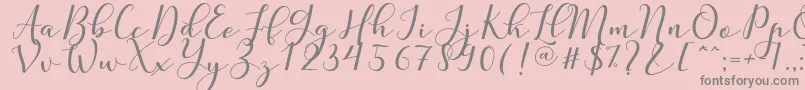 Nafigat Script Font – Gray Fonts on Pink Background