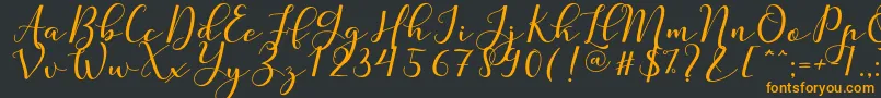 Nafigat Script-fontti – oranssit fontit mustalla taustalla