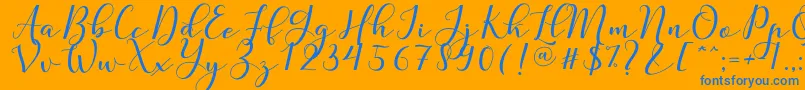 Nafigat Script Font – Blue Fonts on Orange Background