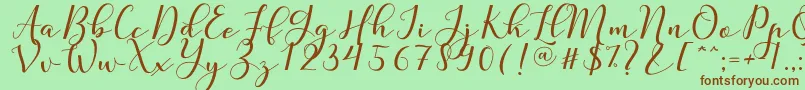 Nafigat Script-Schriftart – Braune Schriften auf grünem Hintergrund