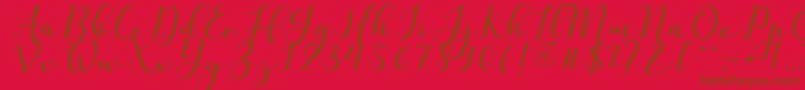 Nafigat Script-Schriftart – Braune Schriften auf rotem Hintergrund