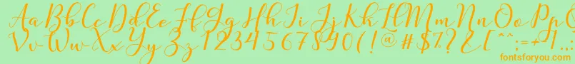 Nafigat Script Font – Orange Fonts on Green Background