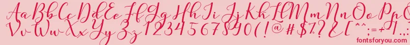 Nafigat Script Font – Red Fonts on Pink Background