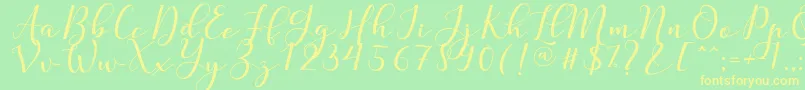 Nafigat Script Font – Yellow Fonts on Green Background