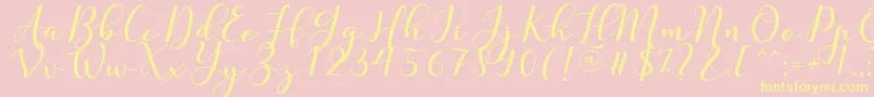 Nafigat Script Font – Yellow Fonts on Pink Background