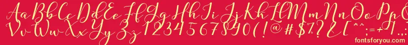 Nafigat Script-Schriftart – Gelbe Schriften auf rotem Hintergrund
