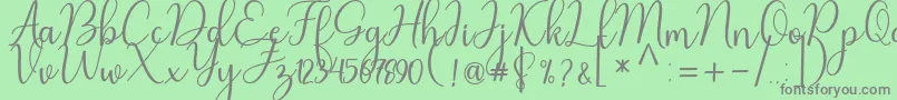 Nafila-Schriftart – Graue Schriften auf grünem Hintergrund