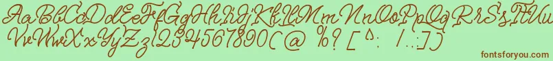 Fonte Nagata Script – fontes marrons em um fundo verde